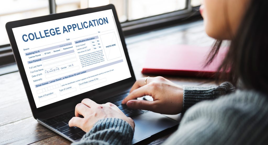 Female student filling up college application form